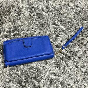 Blue wristlet with gold insides and detachable chain